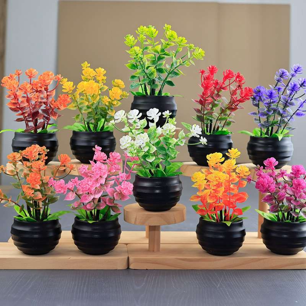 Artificial eucalyptus potted plant with black pot