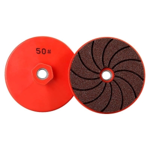 Integrated stone dry grinding pads