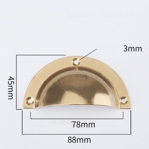 Brass shell-shaped handle