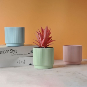 Striped non-porous plastic flower pot