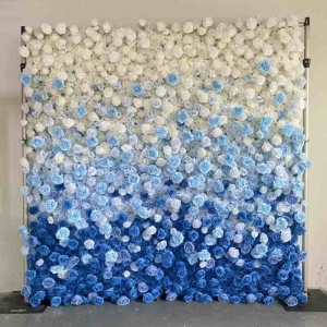 Artificial roses wall in a gradient from white to blue