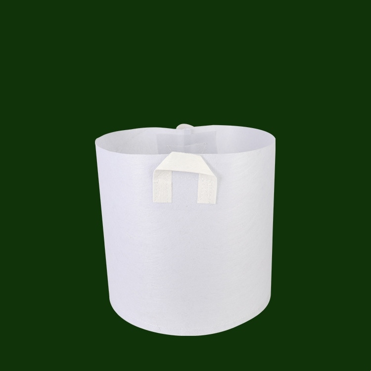 White non-woven planting bags with two handles