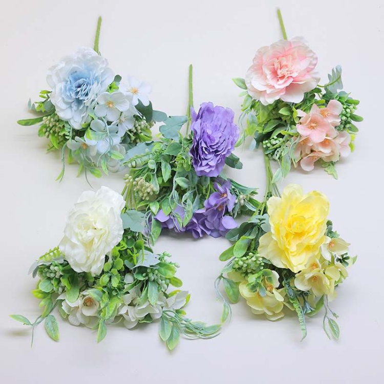 Artificial roses and camellias bouquet