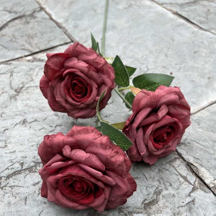 Simulated roses with three flower heads and curled edges