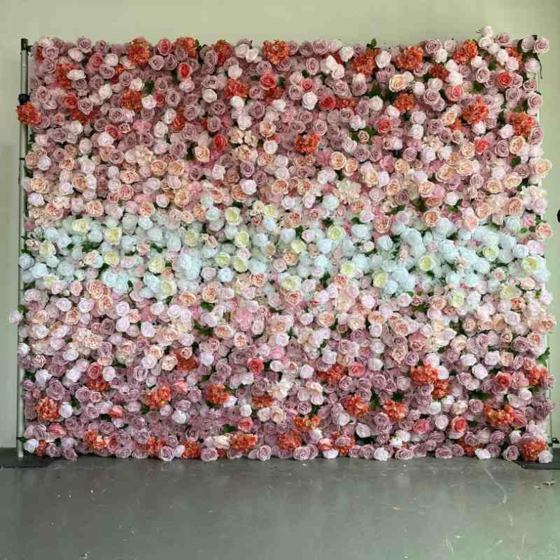 Artificial roses and hydrangeas wall in a gradient from pink to purple