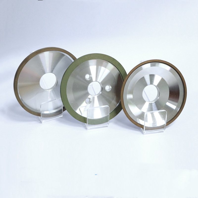 Three-hole disc-shaped diamond resin bonded grinding wheel