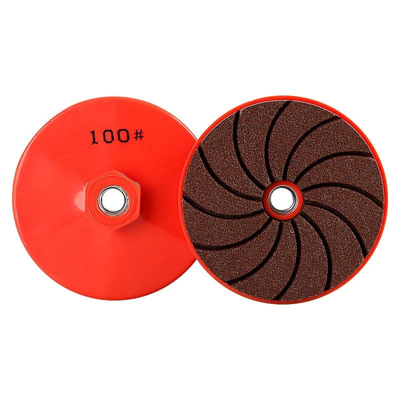 Integrated stone dry grinding pads