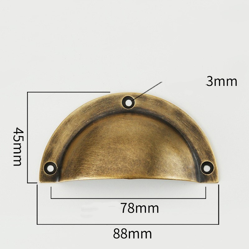 Brass shell-shaped handle