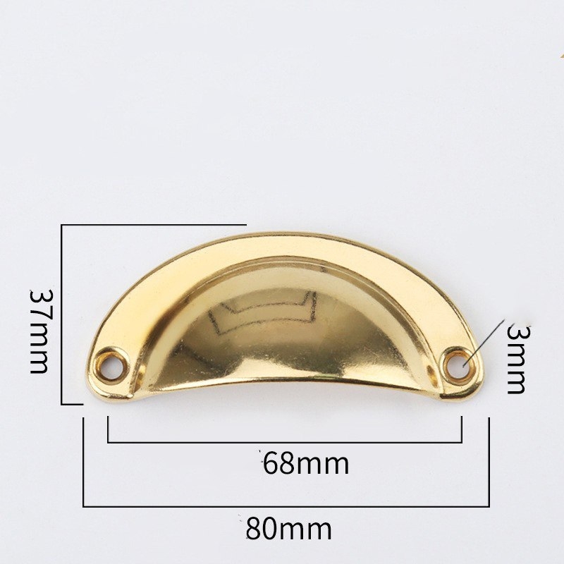 Brass shell-shaped handle