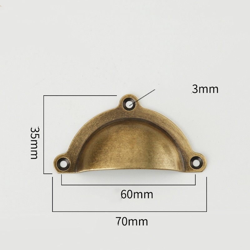 Brass shell-shaped handle