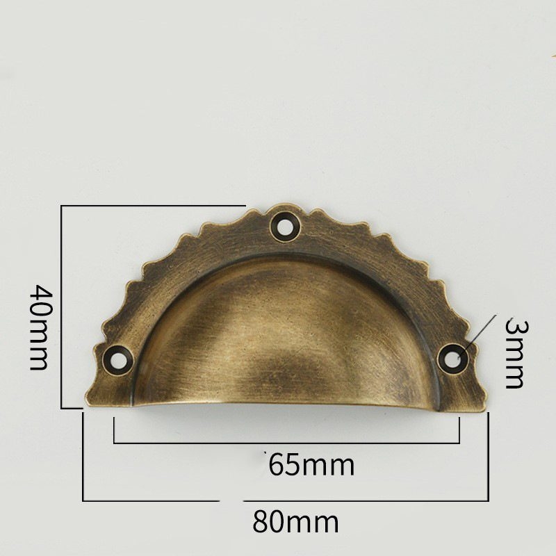 Brass shell-shaped handle