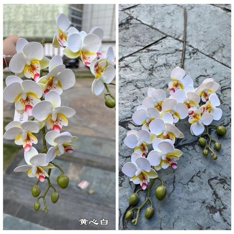 Two branches of artificial butterfly orchids