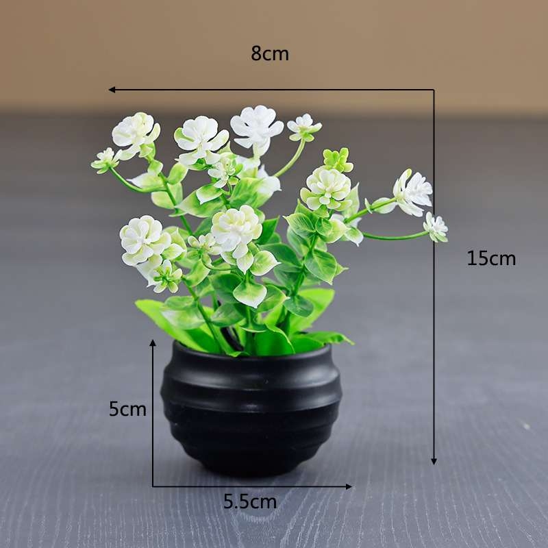 Artificial eucalyptus potted plant with black pot