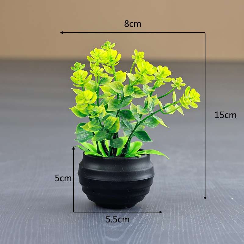 Artificial eucalyptus potted plant with black pot