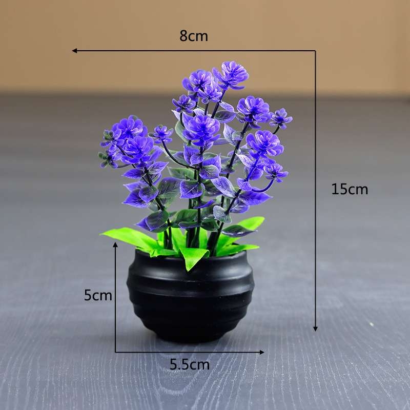 Artificial eucalyptus potted plant with black pot