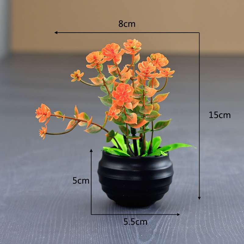 Artificial eucalyptus potted plant with black pot