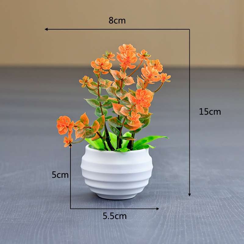 Artificial eucalyptus potted plant with white pot