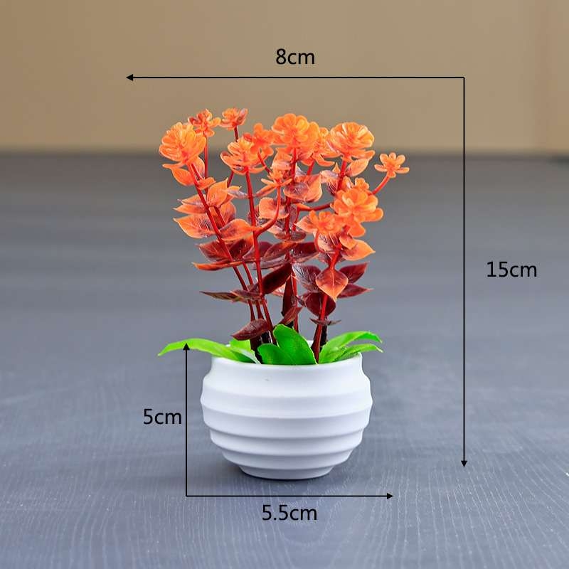 Artificial eucalyptus potted plant with white pot