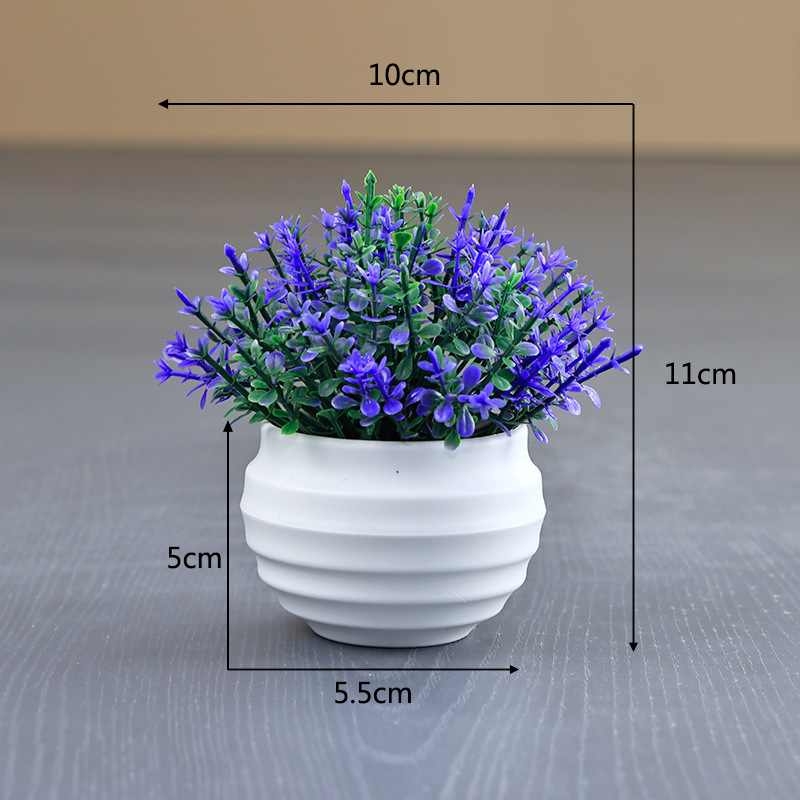 Artificial succulent plant in a white flower pot