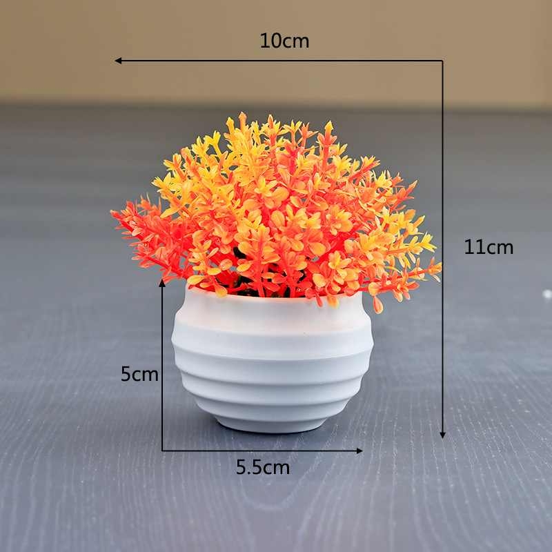 Artificial succulent plant in a white flower pot
