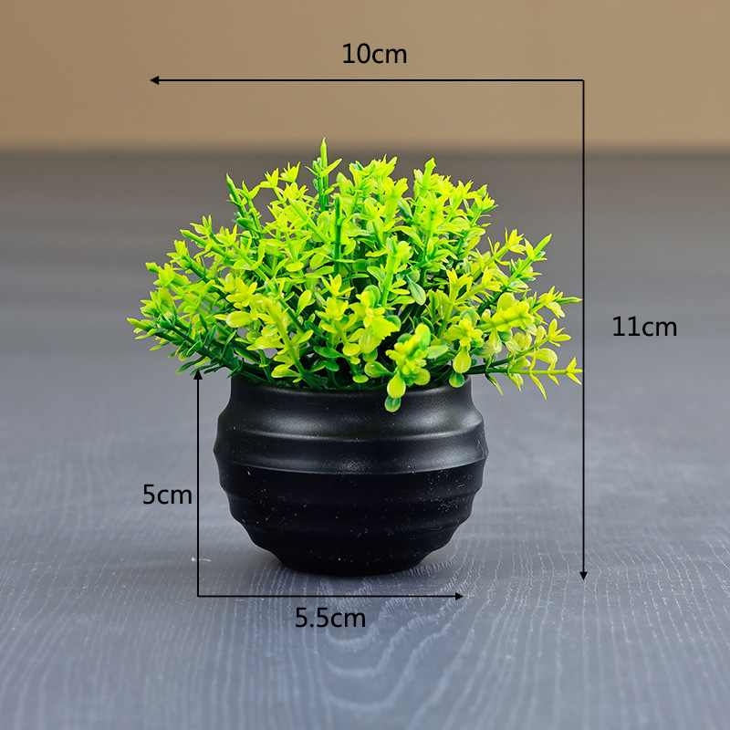 Artificial succulent plant in a black flower pot