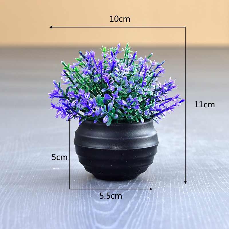Artificial succulent plant in a black flower pot