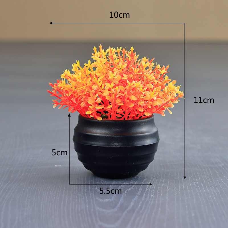 Artificial succulent plant in a black flower pot