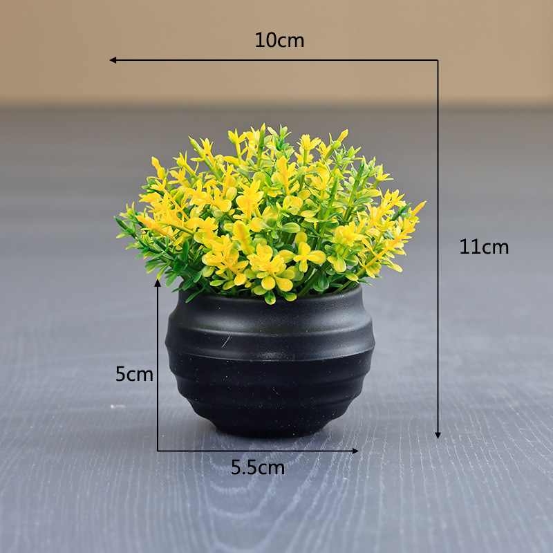 Artificial succulent plant in a black flower pot