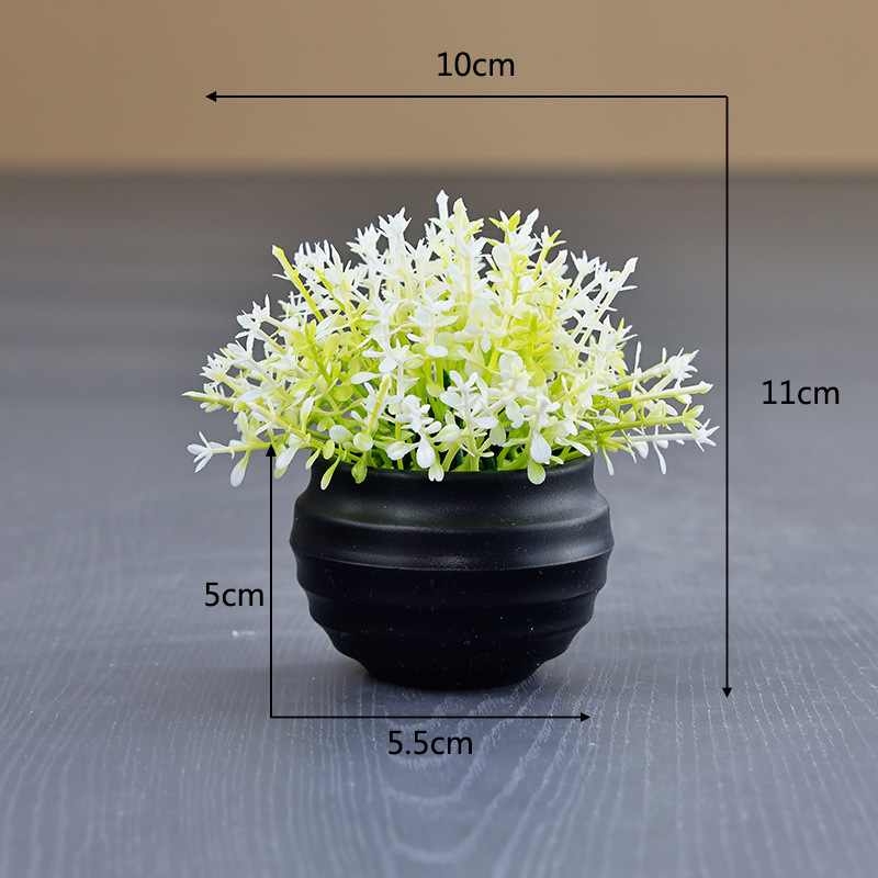 Artificial succulent plant in a black flower pot