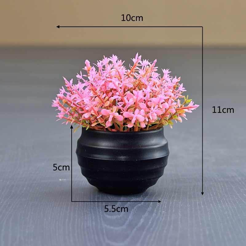 Artificial succulent plant in a black flower pot