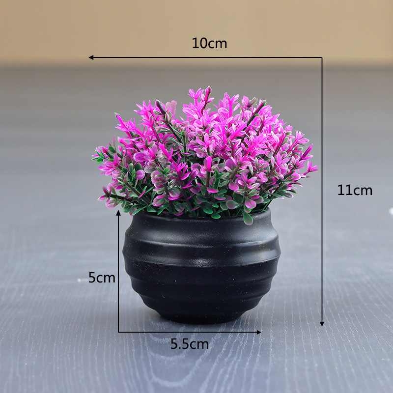 Artificial succulent plant in a black flower pot
