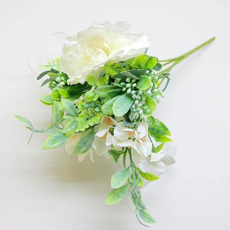 Artificial roses and camellias bouquet