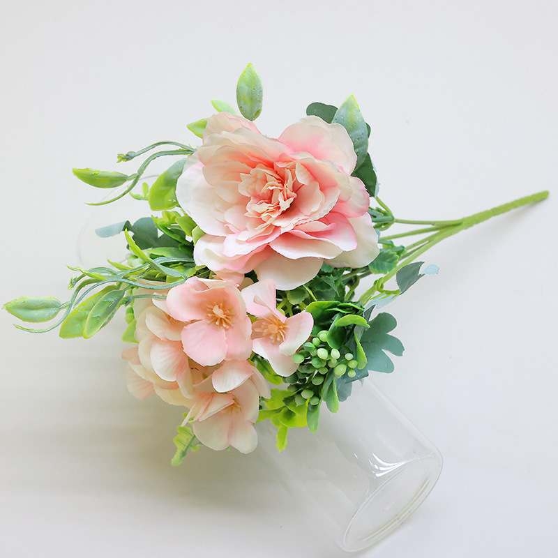 Artificial roses and camellias bouquet