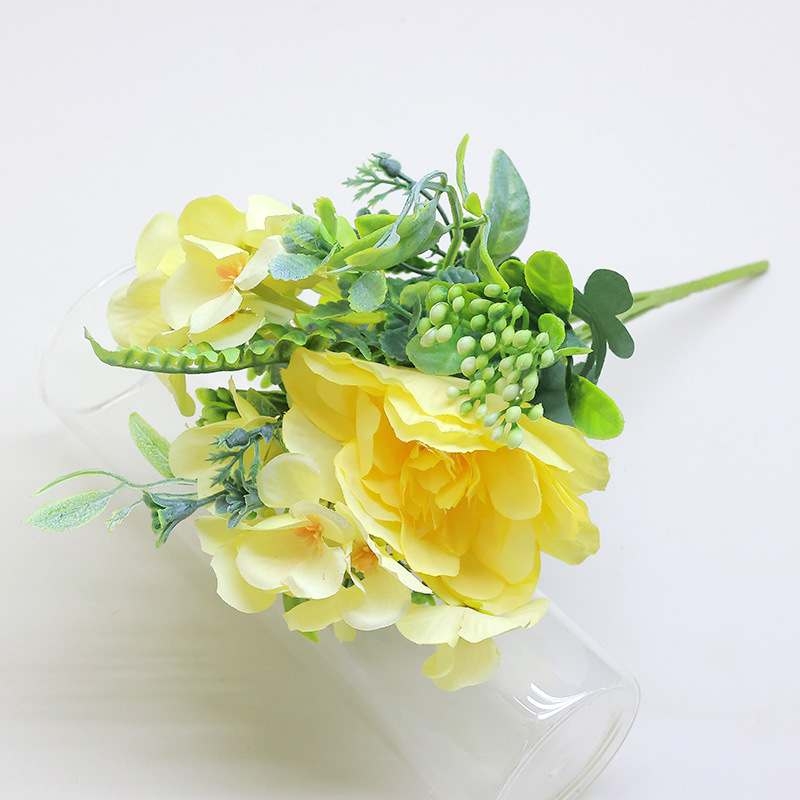 Artificial roses and camellias bouquet