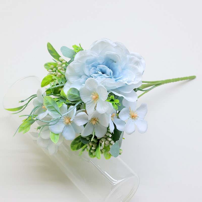 Artificial roses and camellias bouquet