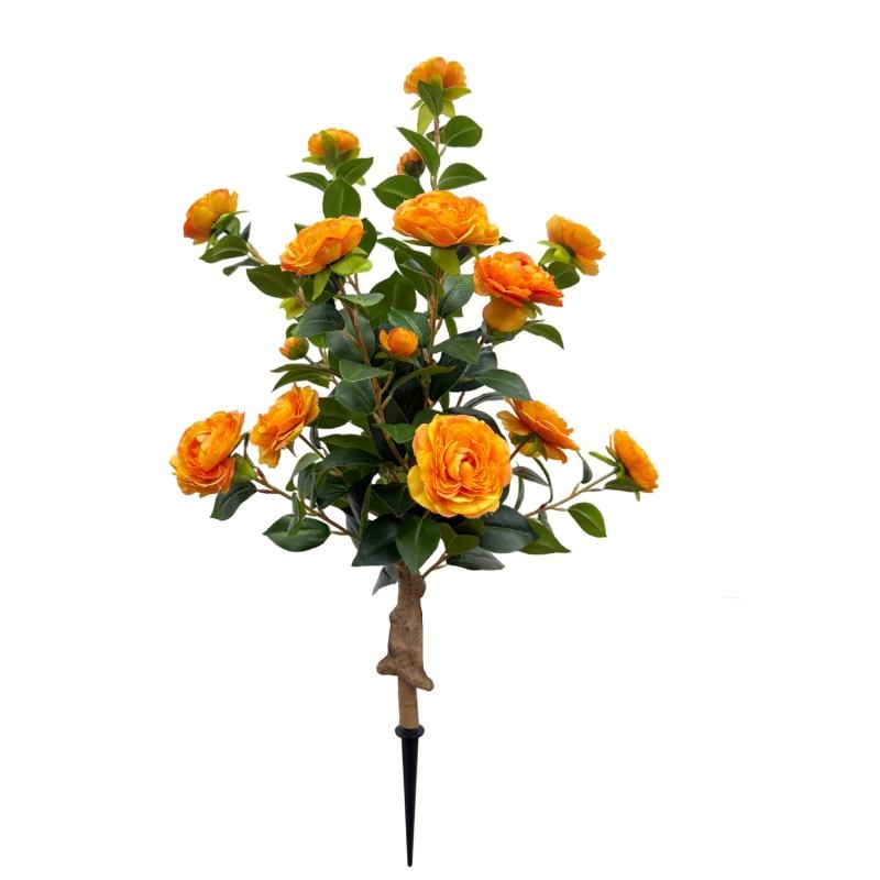 Artificial camellias planted in the ground