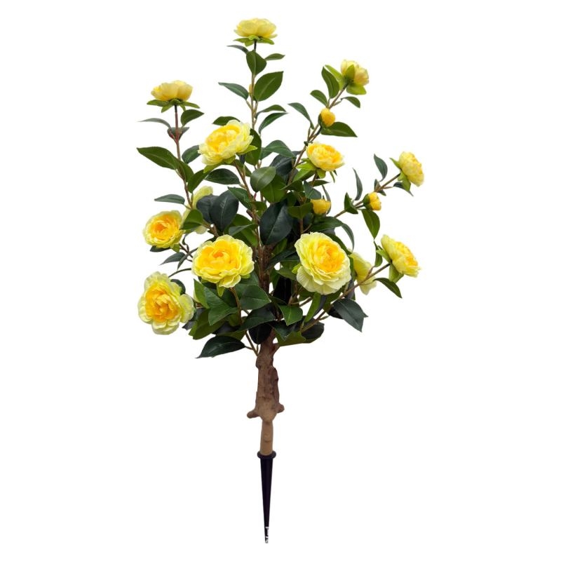 Artificial camellias planted in the ground