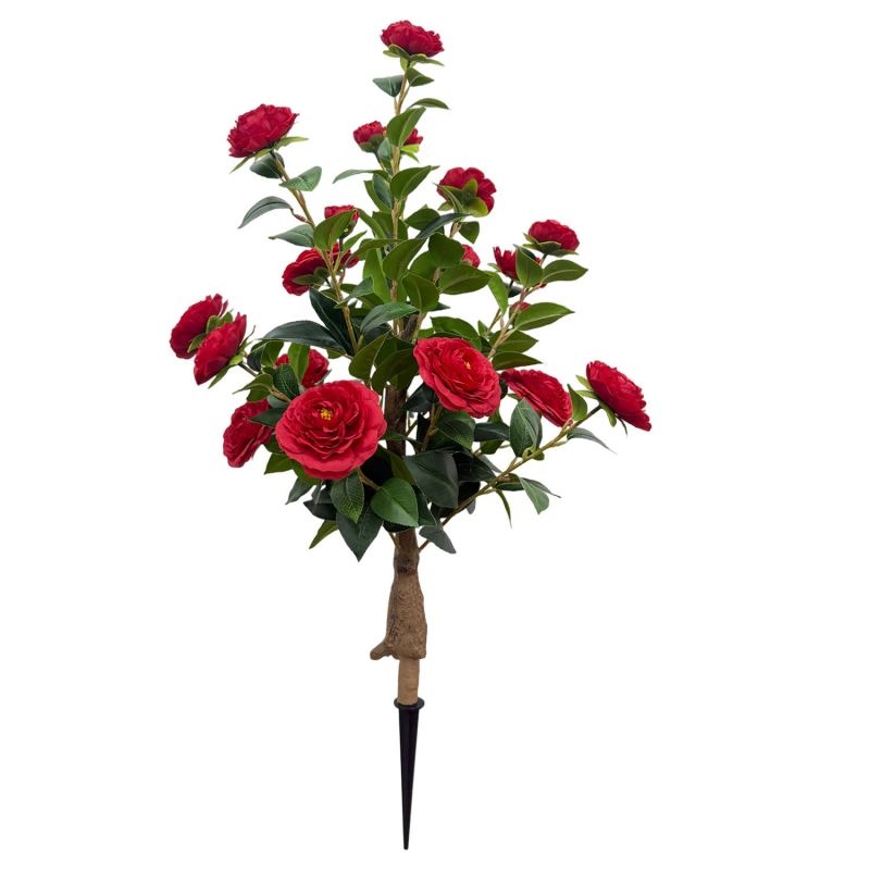 Artificial camellias planted in the ground