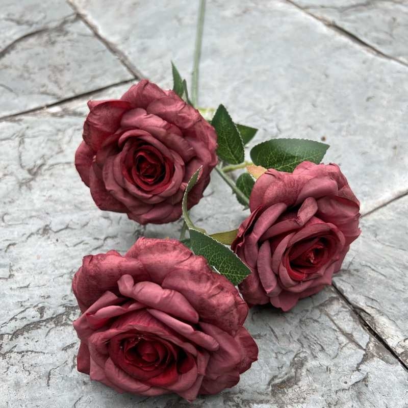 Simulated roses with three flower heads and curled edges