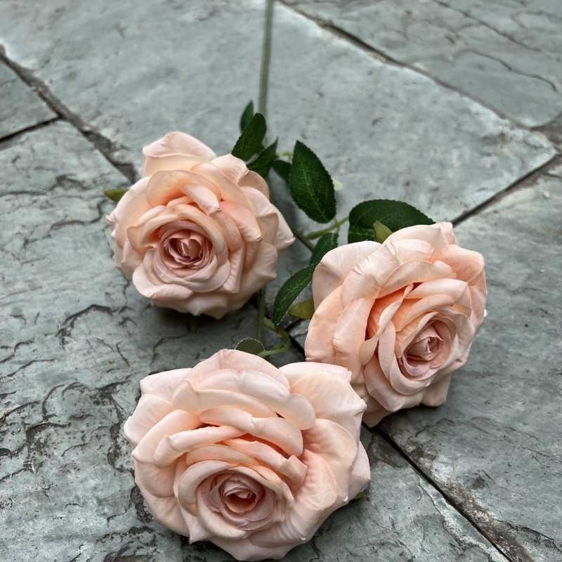 Simulated roses with three flower heads and curled edges