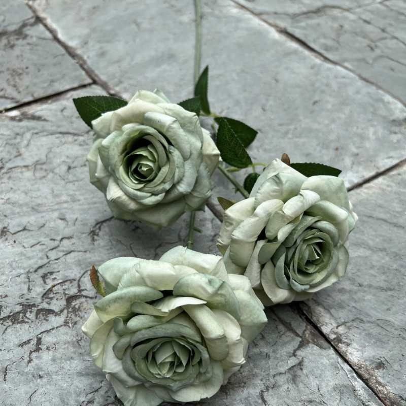 Simulated roses with three flower heads and curled edges