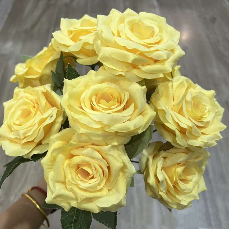 Artificial rose with nine flower heads