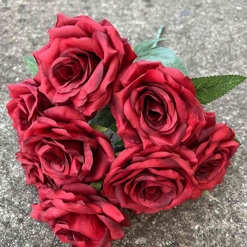 Artificial rose with nine flower heads