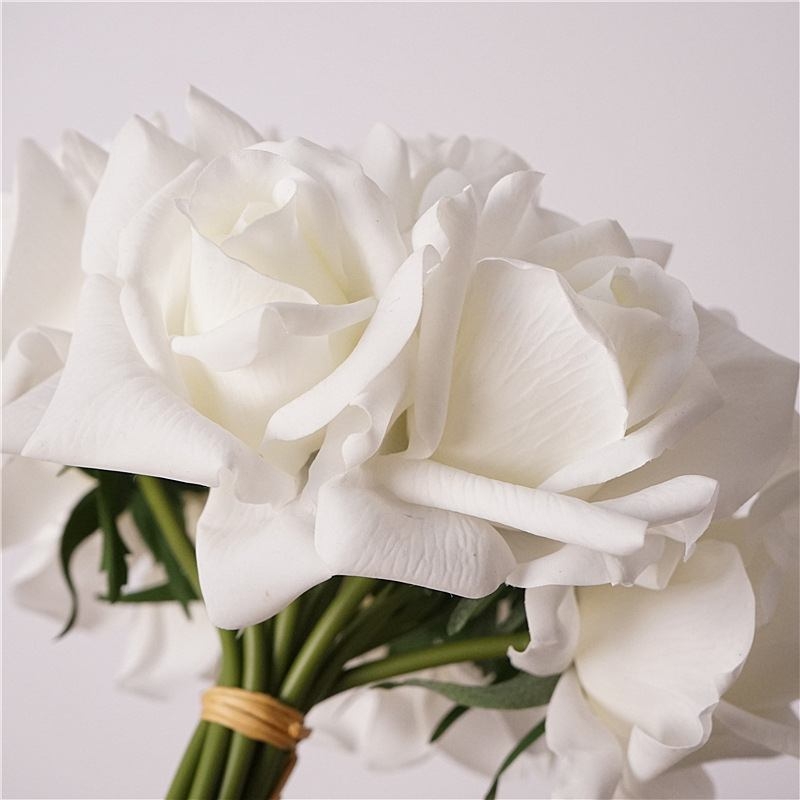 A bunch of thirteen artificial roses