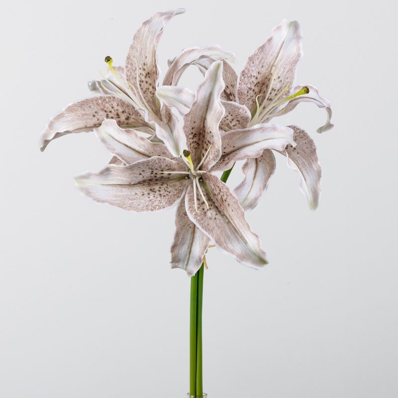 Artificial flower bouquet containing 3 lilies