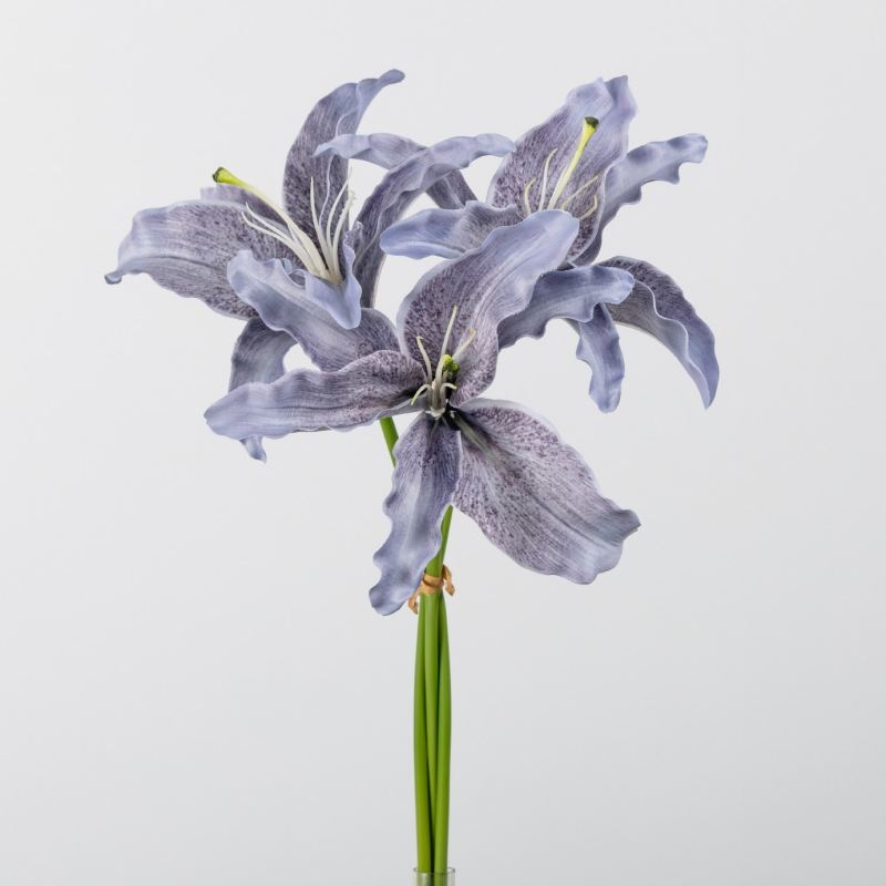 Artificial flower bouquet containing 3 lilies