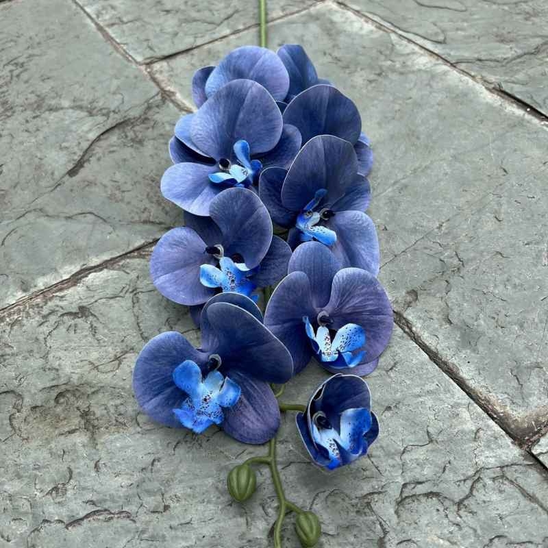 Multi-colored artificial Phalaenopsis orchids with a hand feel