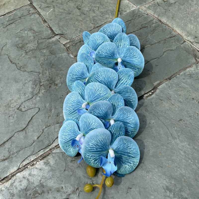 Multi-colored artificial Phalaenopsis orchids with a hand feel