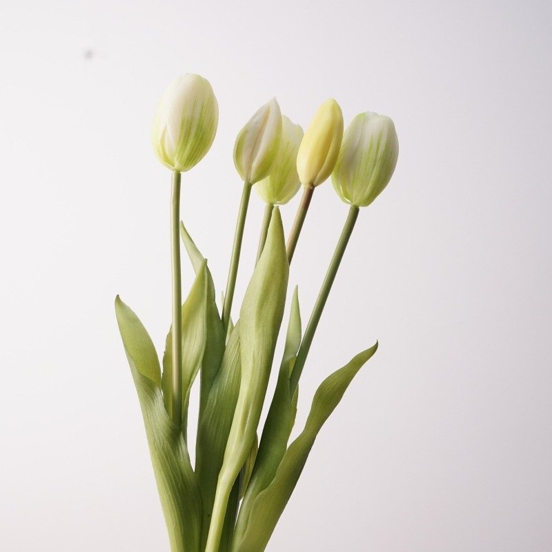 A bouquet of artificial tulips with five flowers