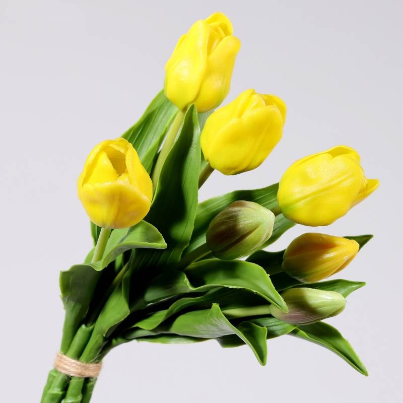 A bouquet of artificial tulips with 7 flowers